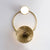 modern brass green glass wall sconce