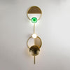 modern brass green glass wall sconce