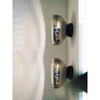 modern chrome glass void surface sconce