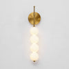 modern gold iron opal glass abacus wall sconce