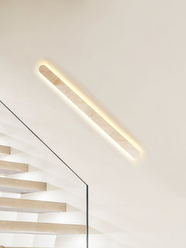 modern honed yellow travertine sculptural led wall sconce