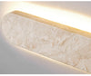 modern honed yellow travertine sculptural led wall sconce