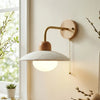 modern travertine disc wall sconce black gold