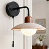 modern travertine disc wall sconce black gold