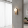 modern yellow travertine arch wall sconce