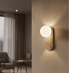 modern yellow travertine arch wall sconce