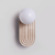 modern yellow travertine arch wall sconce