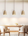 modern yellow travertine cone pendant light
