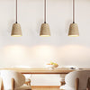 modern yellow travertine cone pendant light