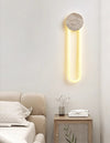 modern yellow travertine disc led wall sconce