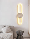 modern yellow travertine disc led wall sconce