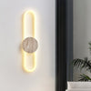 modern yellow travertine disc led wall sconce