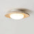 modern yellow travertine elliptical flush mount ceiling light