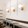 modern yellow travertine glass globe wall sconce 2