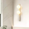 modern yellow travertine glass globe wall sconce 3
