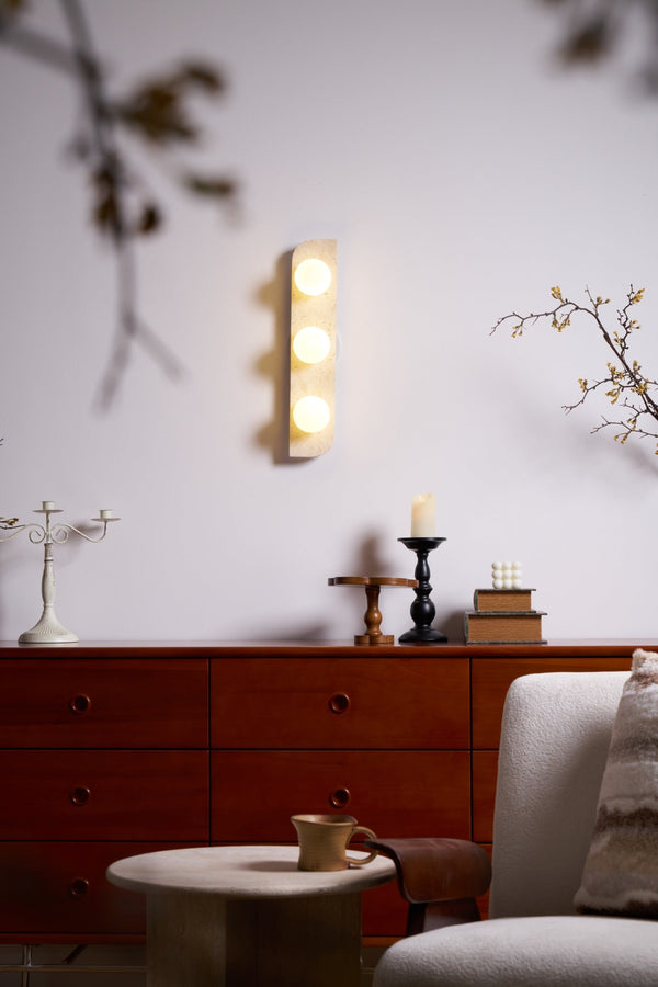 modern yellow travertine glass globe wall sconce