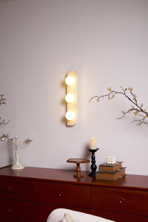modern yellow travertine glass globe wall sconce