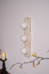 modern yellow travertine glass globe wall sconce