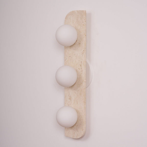 modern yellow travertine glass globe wall sconce
