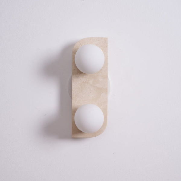 modern yellow travertine glass globe wall sconce