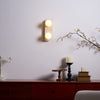 modern yellow travertine glass globe wall sconce