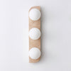 modern yellow travertine glass globe wall sconce