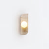 modern yellow travertine glass globe wall sconce