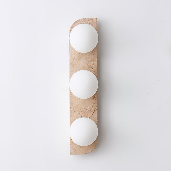 modern yellow travertine glass globe wall sconce