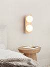 modern yellow travertine glass globe wall sconce