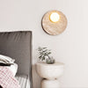 modern yellow travertine glass orb wall sconce