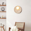 modern yellow travertine glass orb wall sconce