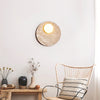 modern yellow travertine glass orb wall sconce