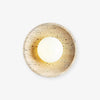 modern yellow travertine lunar eclipse wall sconce