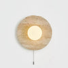 modern yellow travertine lunar eclipse wall sconce