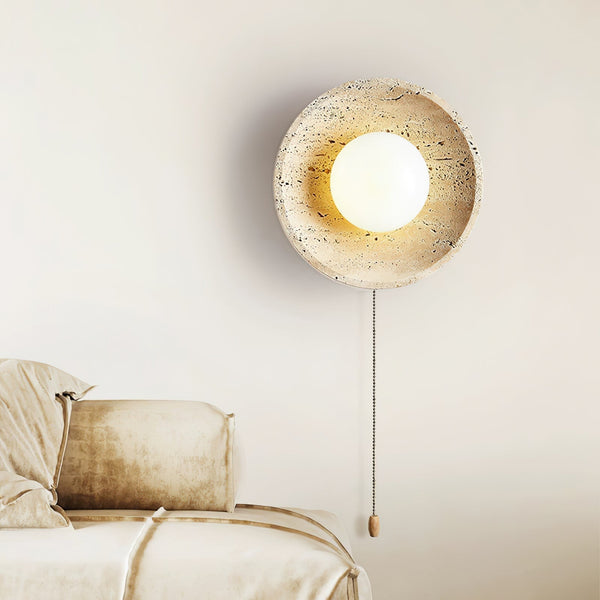 modern yellow travertine lunar eclipse wall sconce