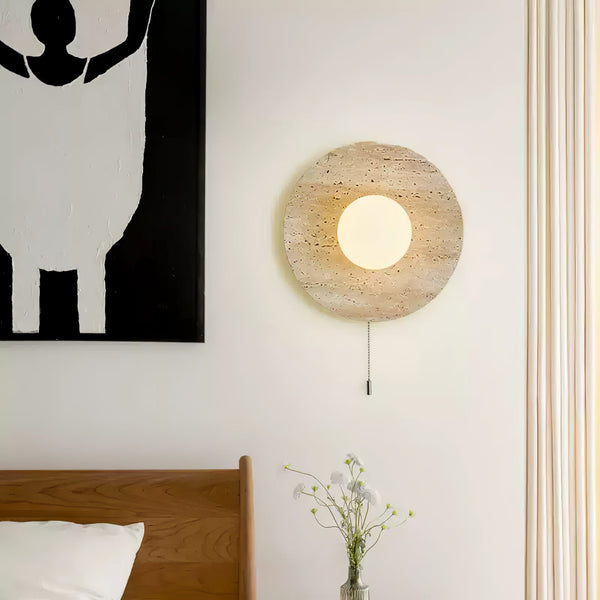 modern yellow travertine lunar eclipse wall sconce