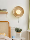 modern yellow travertine lunar eclipse wall sconce