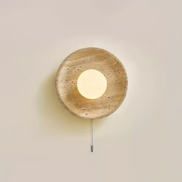 modern yellow travertine lunar eclipse wall sconce