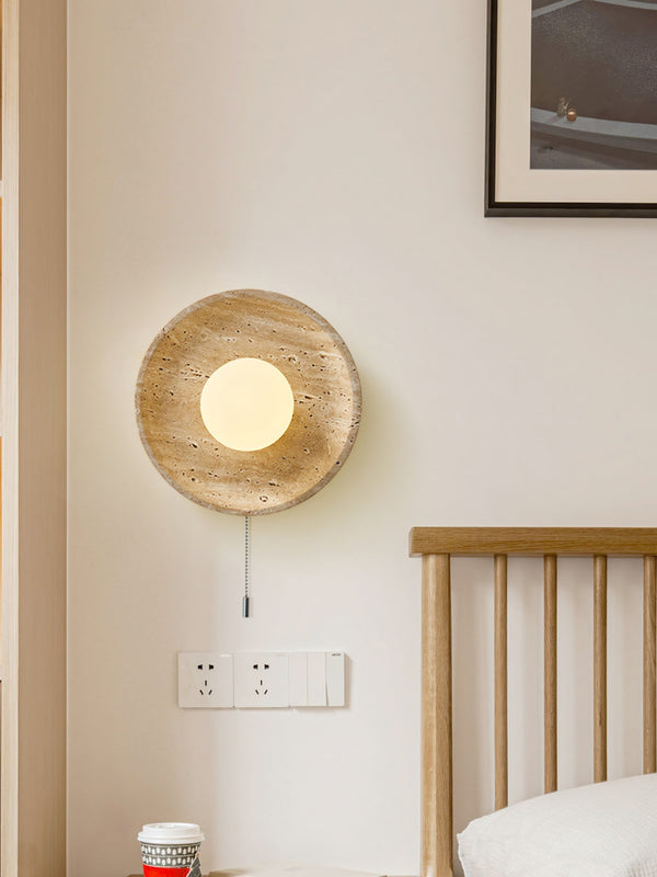 modern yellow travertine lunar eclipse wall sconce