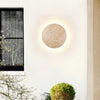 modern yellow travertine round led wall sconce