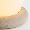 neutral travertine glass globe led table lamp