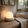 neutral travertine glass globe led table lamp