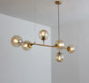 Orb Glass Pendant Light with Brass Accents for Dining Room and Kitchen Island