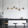 Orb Glass Pendant Light with Brass Accents for Dining Room and Kitchen Island