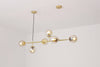 Orb Glass Pendant Light with Brass Accents for Dining Room and Kitchen Island