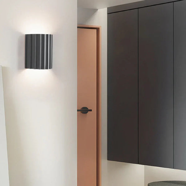 modern white resin ribbed cylinder wall sconce