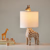 rustic carved wood animal table lamp with fabric shade