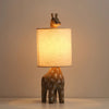 rustic carved wood animal table lamp with fabric shade