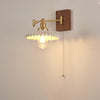 traditional walnut brass glass wall sconce