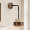 wabi sabi travertine cylinder wall sconce matte black